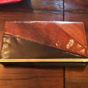 Snakeskin clutch measure approx 12 in by 7in